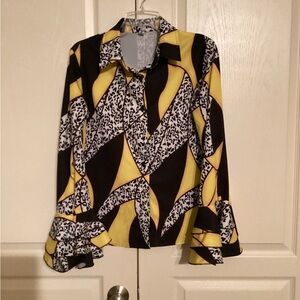 Fabulous black, white, & yellow blouse. Ruffles sleeves. Flattering.
